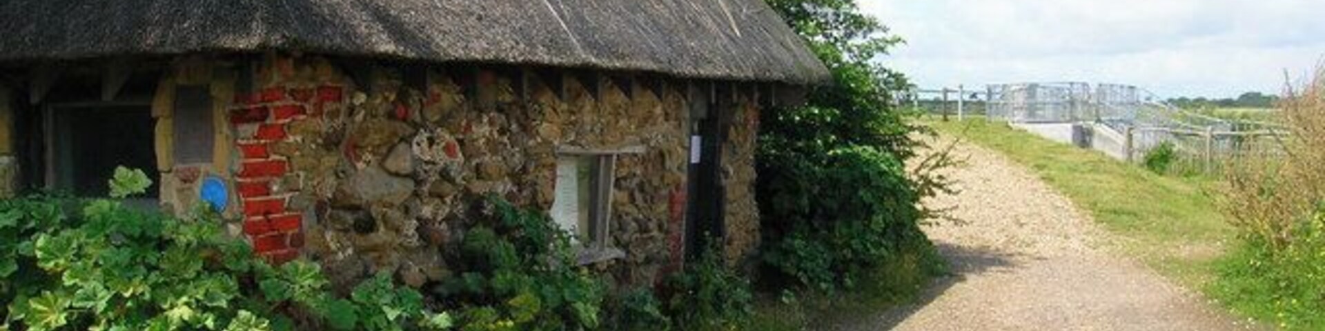 The Salthouse, Pagham Harbour Restored thatched building once used for storing salt now used for tourist information. Located on the corner of Pagham harbour before the footpath heads off across Pagham Wall.