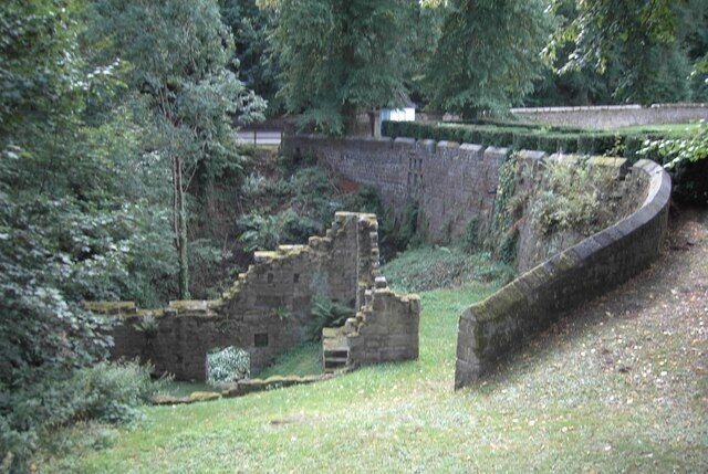 Prudhoe Castle Mill. This is the mill for the castle. When operational the mill brought in important revenue to the estate as all the local farmers used the mill. The mill pond is to the right behind the bridge.