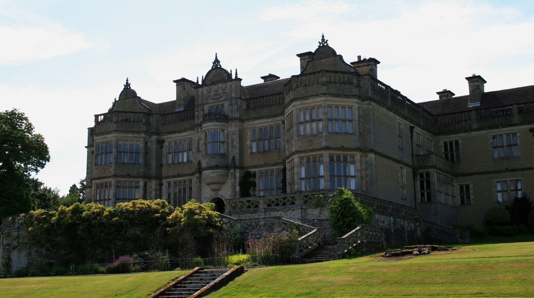 View of English country house Stokesay Court from the lawn.