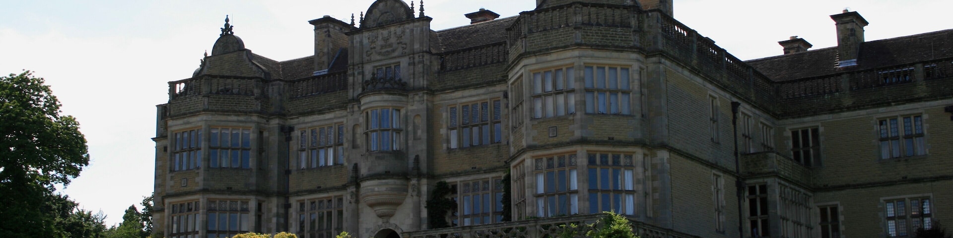 View of English country house Stokesay Court from the lawn.