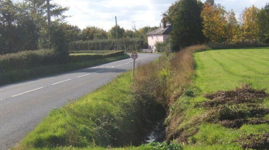 B1113 towards cottage by a corner Just one of many bends on the B1113.