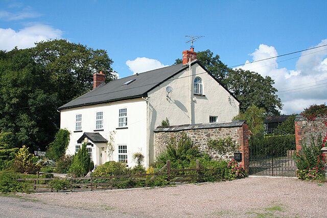 Oakford: Red Deer House. Previously Red Deer Farm, it stands by the old Bampton  South Molton turnpike, now the B3227, and offers bed and breakfast. Looking north-north-west