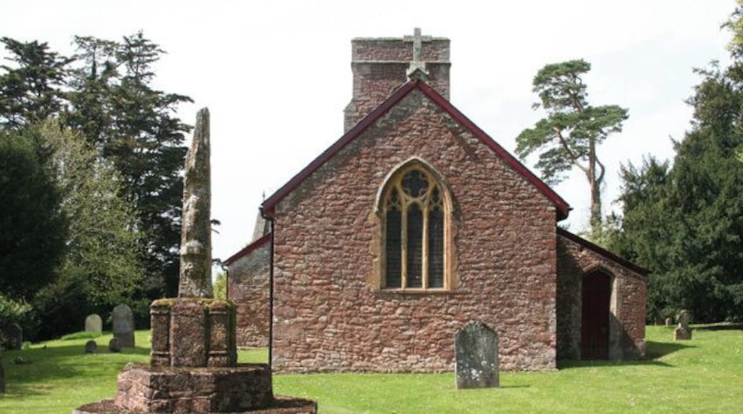 Parish church of St John the Baptist and (left foreground) Medieval churchyard cross, Heathfield, Somerset, seen from the east