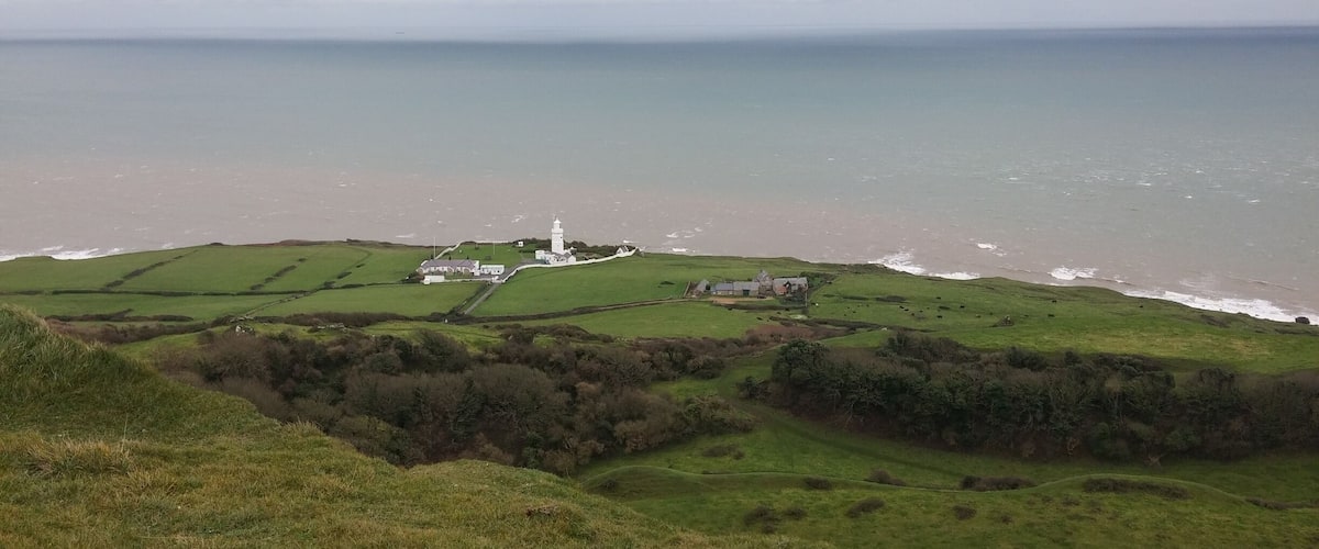 This is St Catherine's Lighthouse looked from a rather nice walk from the viewpoint at Blackgang to Niton.I suggest you make this one on a nicer day than myself as November isn't the most pleasant month around!