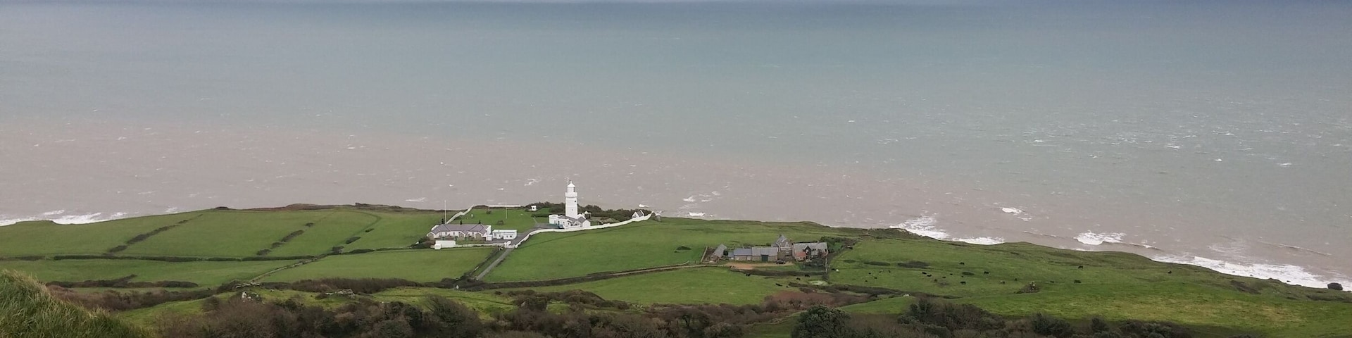 This is St Catherine's Lighthouse looked from a rather nice walk from the viewpoint at Blackgang to Niton.I suggest you make this one on a nicer day than myself as November isn't the most pleasant month around!