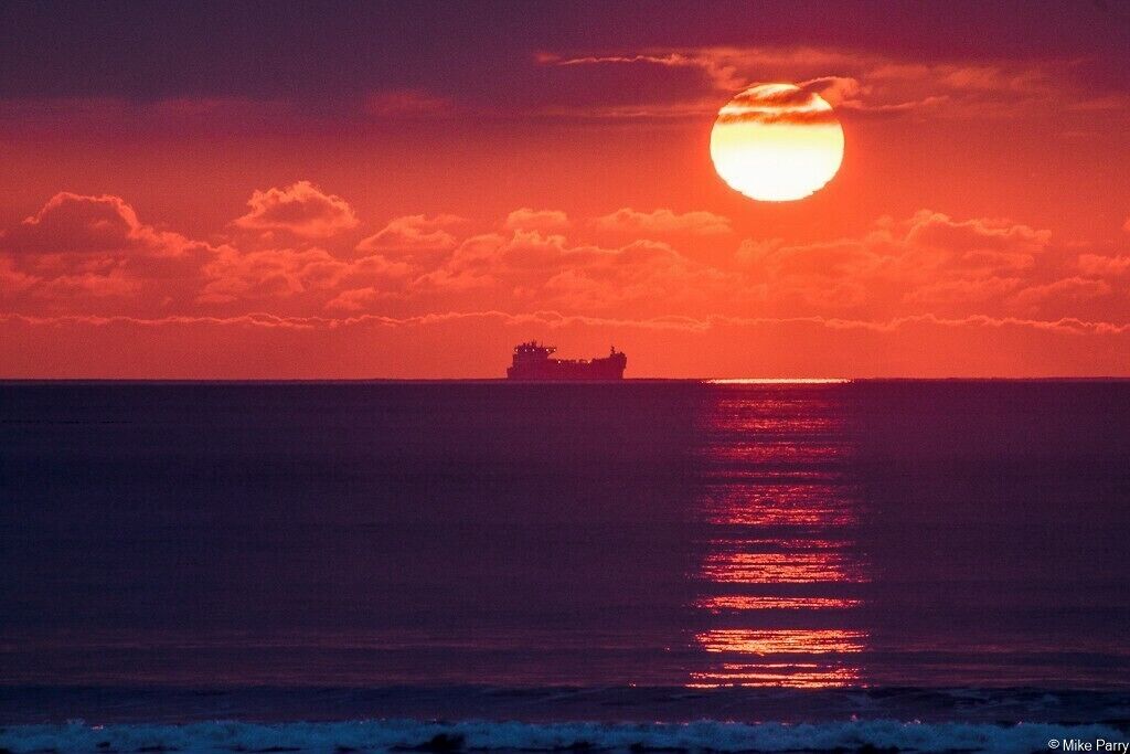 Tanker at anchorage in St Brides Bay. Oil and gas tankers are often seen in the bay either sheltering or more likely waiting to berth on the refinery jetties in Milford Haven