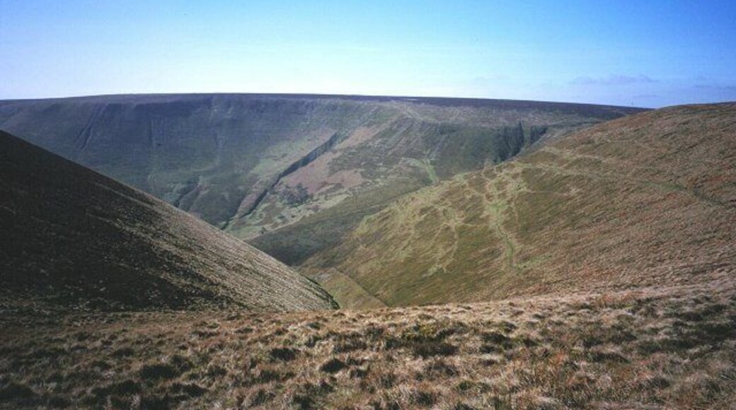 Harley Dingle. The place names in the Radnor Forest are often Herefordshire English. The Harley's are still a big landowning family in the area, they gave their name to Wigmore and Harley streets in London. Looking into the depths from south of Black Mixen (Mixen = midden). The dingle is used to test ammunition for Eley of Birmingham. Across the defile is the corrie of Pant and the Radnorshire high point, Great Rhos.