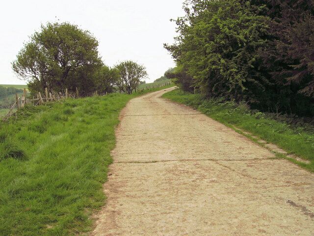Concreted lane (1). From the same location as 430110, and the twisty, hilly nature of this lane is shown. Unfortunately the Viking Way climbs up this lane for a little way before diverging right.