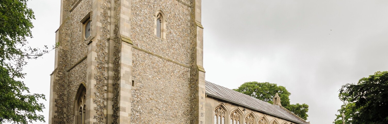 Grade I listed The church dates mainly from the 14th and 15th century, the west tower was rebuilt in 1864. There is a west tower, nave, chancel, north and south aisles and clerestory, north vestry, and south-west Chapel. The church is built in flint and stone with some checker work. The tower has an embattled parapet with crocketted pinnacles, the octagonal tower Lantern was added in the 19th century. The east end of the nave has a small Sanctus bellcote on the roof. The nave has north and south aisles of four bays with further bays for the north Chapel. The clerestory was added in the 15th century. There is a fine 15th century hammerbeam roof with carved Angels and original colouring. In the chancel, there is a 19th-century reredos with a painting of "The raising of Lazarus". The east window has glass by De la Roche of Paris, 1844. The pulpit is octagonal, with tester from 1636, and there is a 14th century piscina in the north east Chapel. There are several brasses in the church, however these are covered by carpet. The interior of the church has been whitewashed, including the coved chancel ceiling. There is a small two manual organ which was installed in 1990.