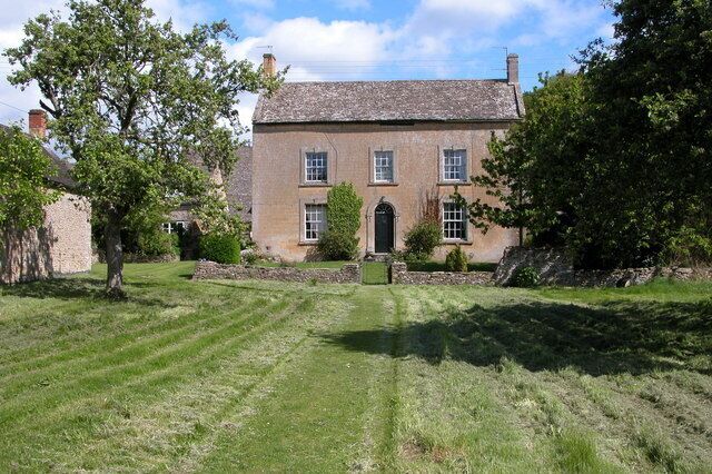 House in the village of Naunton. This impressive house is set back from the road in the village of Naunton.