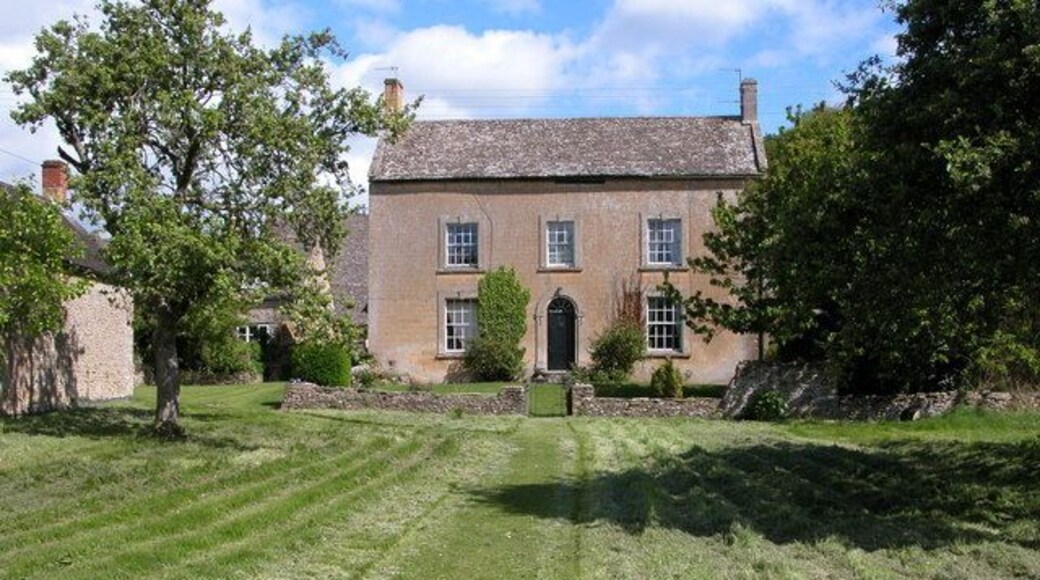 House in the village of Naunton. This impressive house is set back from the road in the village of Naunton.