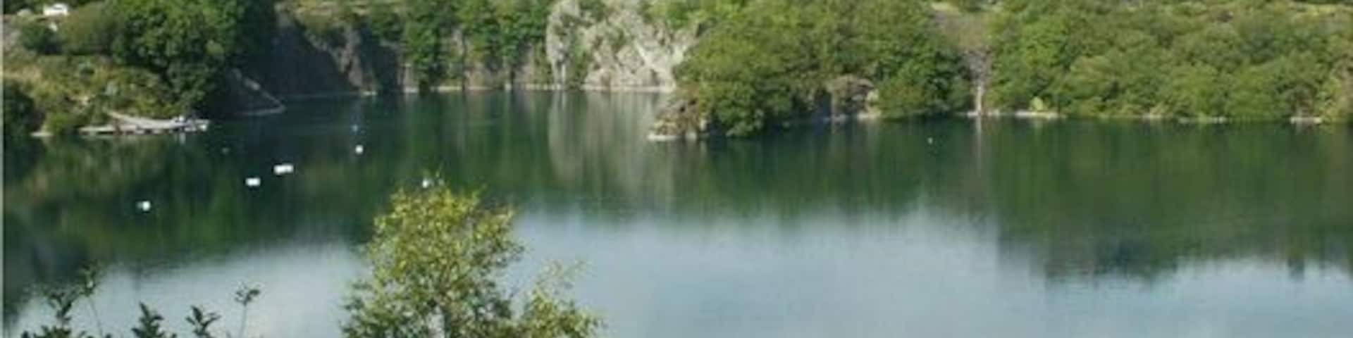 Dorothea Quarry flooded workings A view of the flooded Dorothea Quarry, looking East and taken close by the Cornish beam engine house. The flooded quarry is used for diving, and is accessed via the landing stage to the left of the picture.