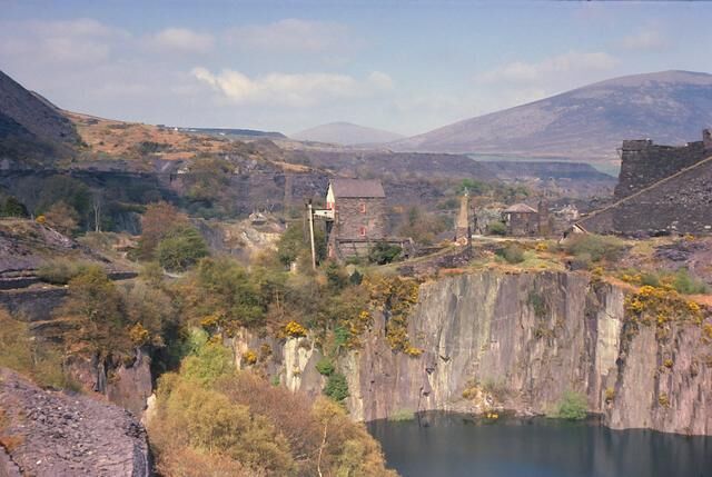 Dorothea pumping engine and Penyrorsedd Quarries. The view shows the apparently precarious situation of the engine house between two of the quarry pits. The Penyrorsedd workings can be seen away into the distance. As can be seen in 2106 nature is reclaiming this industrialised area and the view in this 1976 picture would be difficult to replicate today.