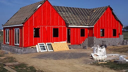 House under construction at Mybster The startling red colour of the insulation materials comes as something of a shock in the Caithness wilderness. You could see this for miles!