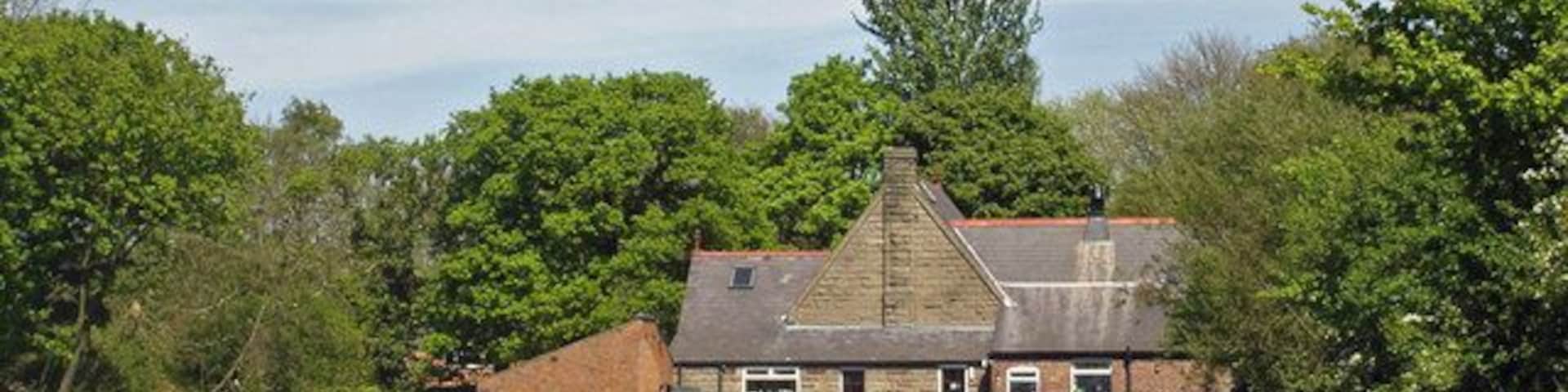 'Super Tots' day nursery Former Wesleyan chapel (1816, rebuilt 1887), now 'Super Tots' day nursery, on Chapel Lane, Mouldsworth.