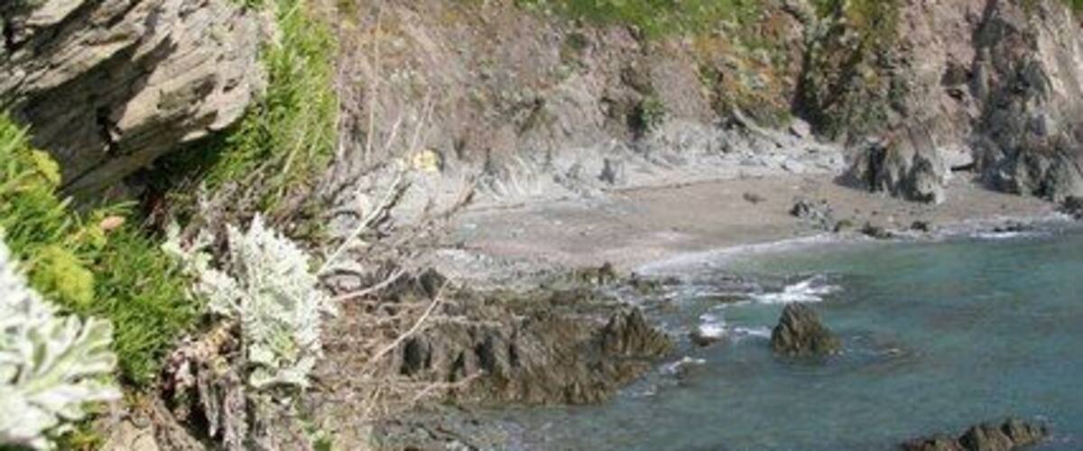 Precipitous path Steep and narrow descent to Grunta Beach
