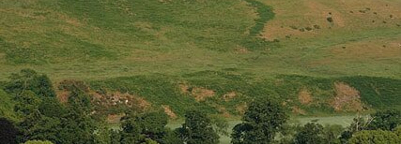 Corbet Tower This small tower stands in a private garden and is not open to the public. Dating back to the 16th century, it was rebuilt by the Ker family after the original building was burnt by the English in 1544. Viewed from Morebattle Hill.