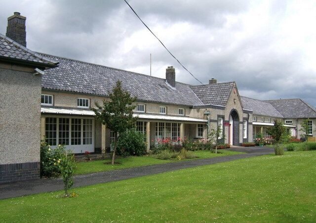 Morebattle Primary School Built in the nineteen thirties as a junior secondary school. The classroom 'walls' on this side fold back almost completely, as do the top halves of the opposite wall of each room. A healthy environment!