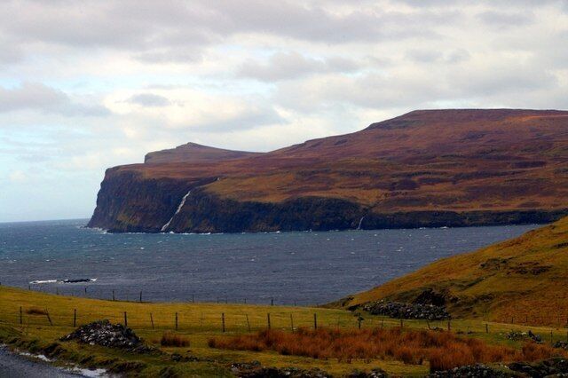 Loch Pooltiel / Loch Pol an t-Sìl A view from Lower Milovaig across the loch to the waterfalls which plunge straight into the sea from the slopes of Ben Ettow and Scoval.