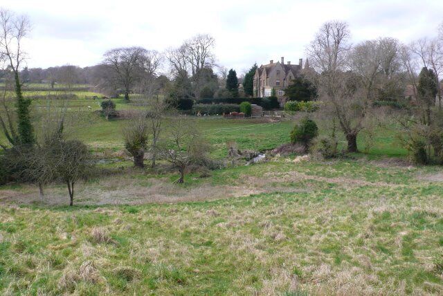 Milborne Port View east from close to the church across the fields to the A30 Yeovil road which is behind the houses on the right