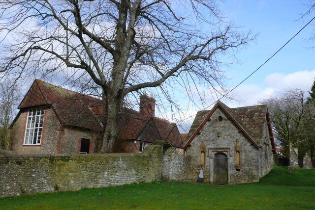 Church Hall Milborne Port The church hall is on the left just outside the church wall. The smaller building inside the churchwall is older and is now used for storage.