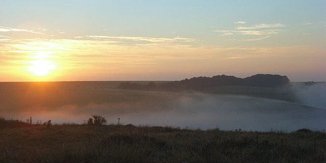 Sunrise on the downs, Mere Looking across a mist-filled Aucombe Bottom, one of a series of combes on the scarp above Mere. A blanket of mist seemed to stretch for many miles across the comparatively flat country to the south.