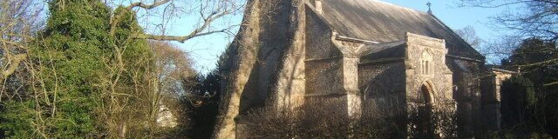 St Mary's Church, Mellis Showing the remarkable buttresses at the west end. The porch is also distinctive.