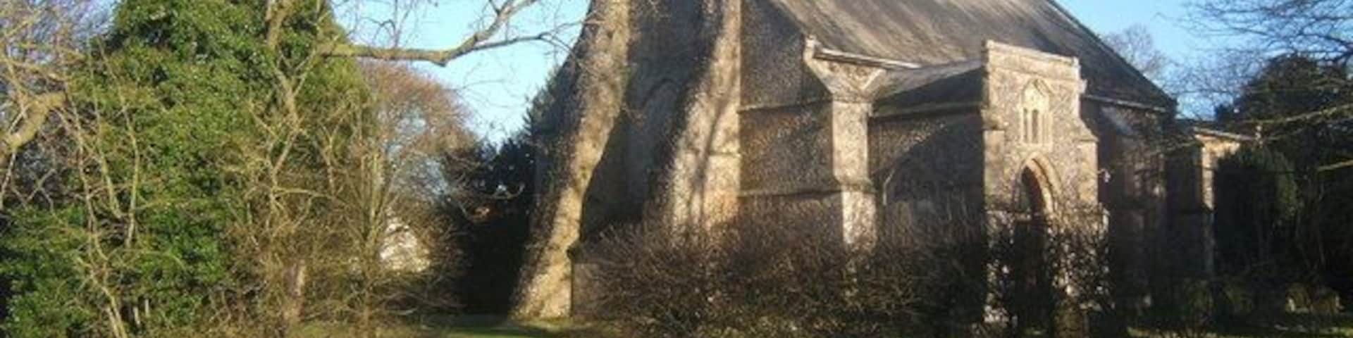 St Mary's Church, Mellis Showing the remarkable buttresses at the west end. The porch is also distinctive.