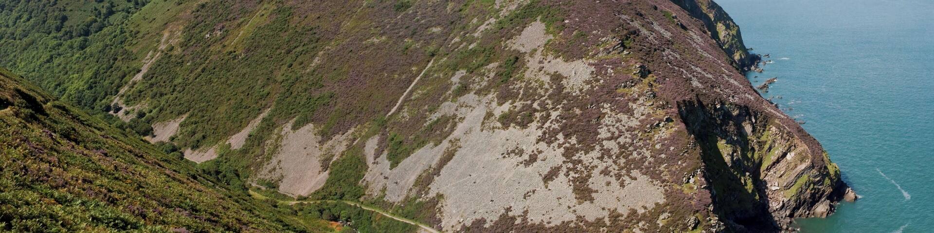 A view of the valley of the Heddon river, with the mouth of the Heddon to the lower right (out of view). Peter Rock can be seen on the opposing cliff. Photographs taken from Highveer Point on the South West Coast Path, North Devon.