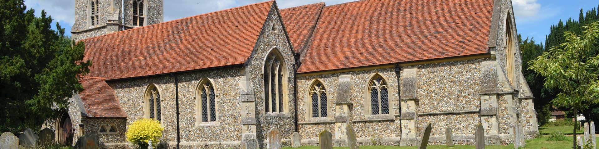 The church dates from the 12th century, but was largely demolished in 1863 and rebuilt in 1864. It originally consisted of the nave and chancel, and a south aisle was added followed by a small private Chapel on the north side. The north transept is 15th C. and the roof of the north transept and nave are also 15th century. There is also a fine choir screen from the same period. The north transept was built around 1400, and originally had stained-glass windows with ancient coats of arms including those of the donors the Bataille family. This area was later used by Lords of Battles Manor as their private Chapel. The Chapel contains a Memorial to Sir William Waad of Battles Hall, who was a notable diplomat and officer of state. He was Lieutenant of the Tower of London for eight years where some of his prisoners included Guy Fawkes and Sir Walter Raleigh. The chancel was rebuilt in 1746 by Henry Woodyer. The tower was demolished in 1863 as it was unsafe. The present tower contains six bells.