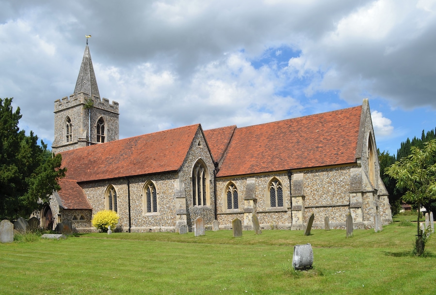 The church dates from the 12th century, but was largely demolished in 1863 and rebuilt in 1864. It originally consisted of the nave and chancel, and a south aisle was added followed by a small private Chapel on the north side. The north transept is 15th C. and the roof of the north transept and nave are also 15th century. There is also a fine choir screen from the same period. The north transept was built around 1400, and originally had stained-glass windows with ancient coats of arms including those of the donors the Bataille family. This area was later used by Lords of Battles Manor as their private Chapel. The Chapel contains a Memorial to Sir William Waad of Battles Hall, who was a notable diplomat and officer of state. He was Lieutenant of the Tower of London for eight years where some of his prisoners included Guy Fawkes and Sir Walter Raleigh. The chancel was rebuilt in 1746 by Henry Woodyer. The tower was demolished in 1863 as it was unsafe. The present tower contains six bells.