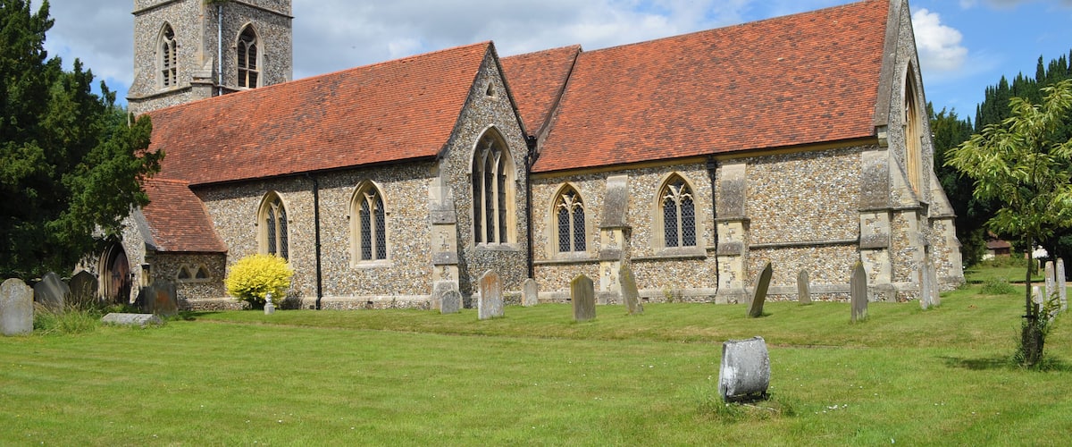 The church dates from the 12th century, but was largely demolished in 1863 and rebuilt in 1864. It originally consisted of the nave and chancel, and a south aisle was added followed by a small private Chapel on the north side. The north transept is 15th C. and the roof of the north transept and nave are also 15th century. There is also a fine choir screen from the same period. The north transept was built around 1400, and originally had stained-glass windows with ancient coats of arms including those of the donors the Bataille family. This area was later used by Lords of Battles Manor as their private Chapel. The Chapel contains a Memorial to Sir William Waad of Battles Hall, who was a notable diplomat and officer of state. He was Lieutenant of the Tower of London for eight years where some of his prisoners included Guy Fawkes and Sir Walter Raleigh. The chancel was rebuilt in 1746 by Henry Woodyer. The tower was demolished in 1863 as it was unsafe. The present tower contains six bells.