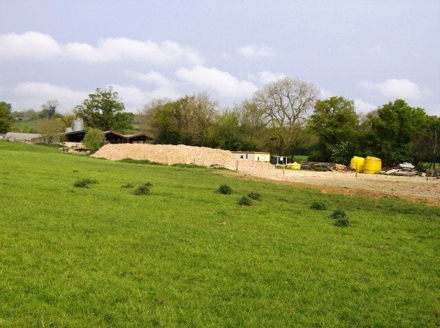Farm storage area View of the working side of a farm from the Macmillan Way, which crosses the adjacent grassland.