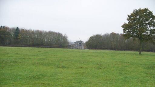 Towards the Fire College The footpath from Great Wolford crosses the field to meet the track that runs around part of what once was RAF Moreton-in-Marsh. The line of trees mark the track and the boundary fence of the Fire Service Technical College which now occupies the airfield.