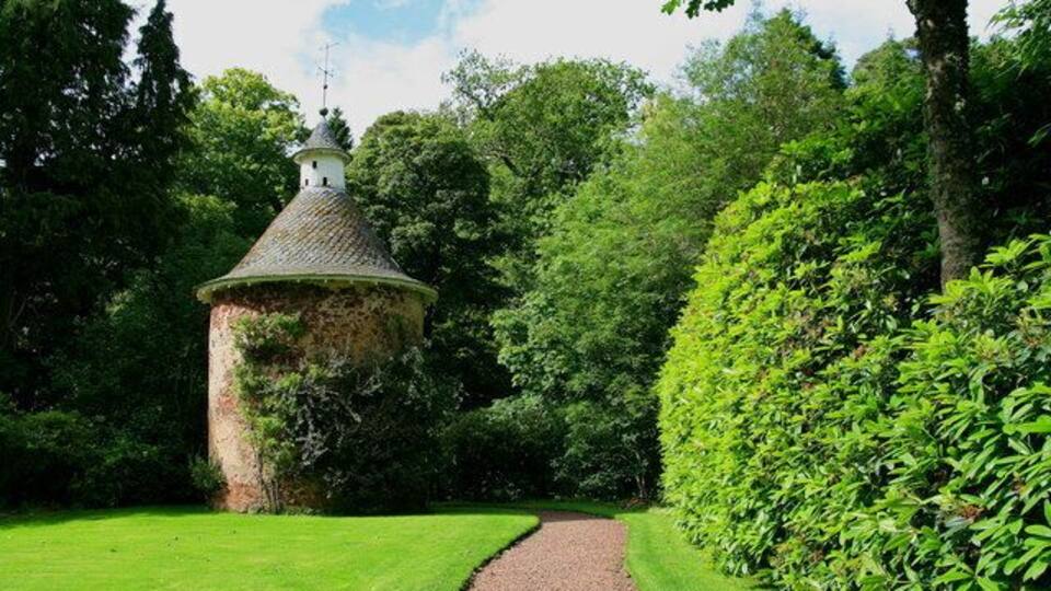 Longformacus House Doocot Early to mid 18th century circular red sandstone doocot with conical roof, surmounted by conical, timber drum with arched pigeon openings. It has been reported that there are 490 wooden nests inside. It is thought to be contemporary with the nearby Longformacus House