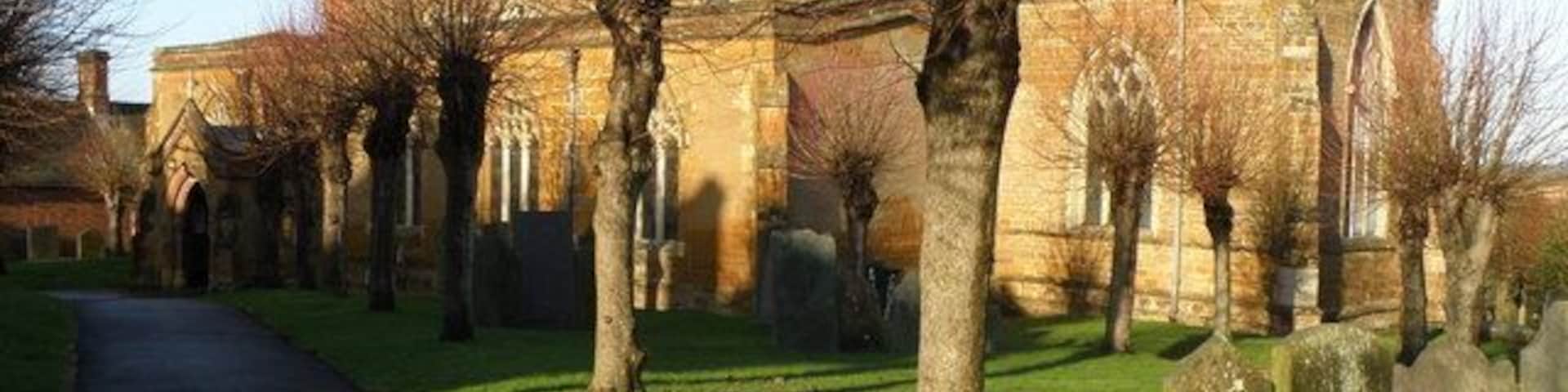 Long Buckby Church A bright December day enhances the colour of the local stone used in the construction of the church.