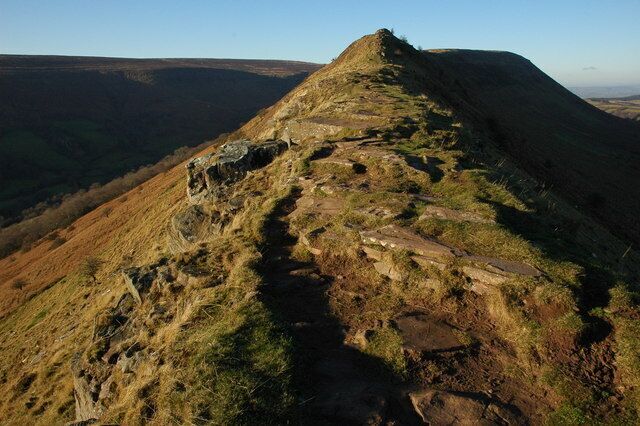 Cat's Back Ridge Cat's Back Ridge is a narrow ridge rising up to the Black Hill. This is a wonderful ridge walk with beautiful views over the Herefordshire country.
