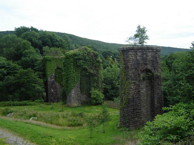Piers from dismantled viaduct These ruins once carried a railway over the road from which I took the shot, and the river valley below. This is one of a number of dead railways in the area.