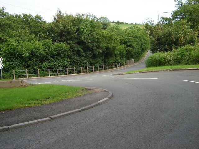 Junction of link road with the A4061 This link road links the A 4061 with the A4093, and certainly makes more sense than to try to turn left just up the road!