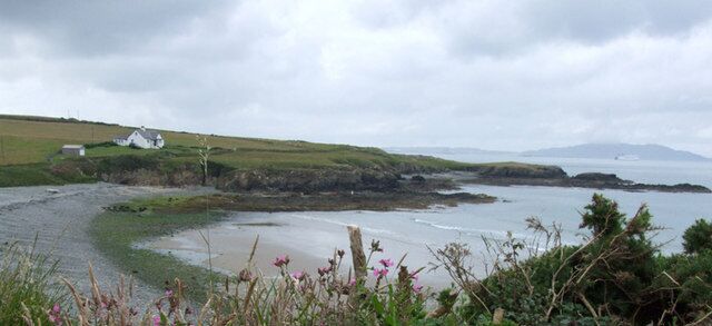 Porth Trwyn Porth Trwyn (mid tide) looking south/west with Holyhead Mountain to the right.