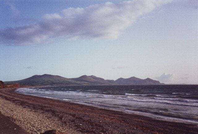 Dinas Dinlle beach looking towards the Lleyn Peninsula The beach is a popular place for kite flying, though there are none on the photo which was taken in the evening.