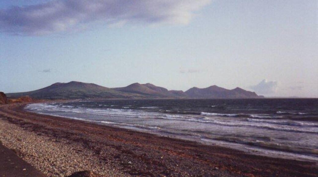 Dinas Dinlle beach looking towards the Lleyn Peninsula The beach is a popular place for kite flying, though there are none on the photo which was taken in the evening.