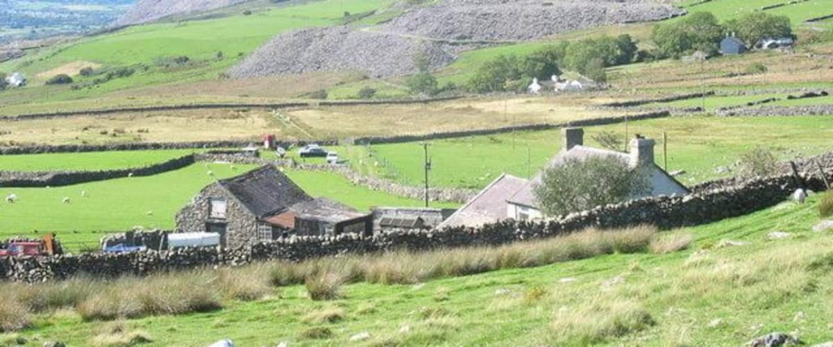 Castell Caeronwy. A small holding on the moorland edge. The name Castell Caeronwy comes from a nearby Iron Age fortlet.
