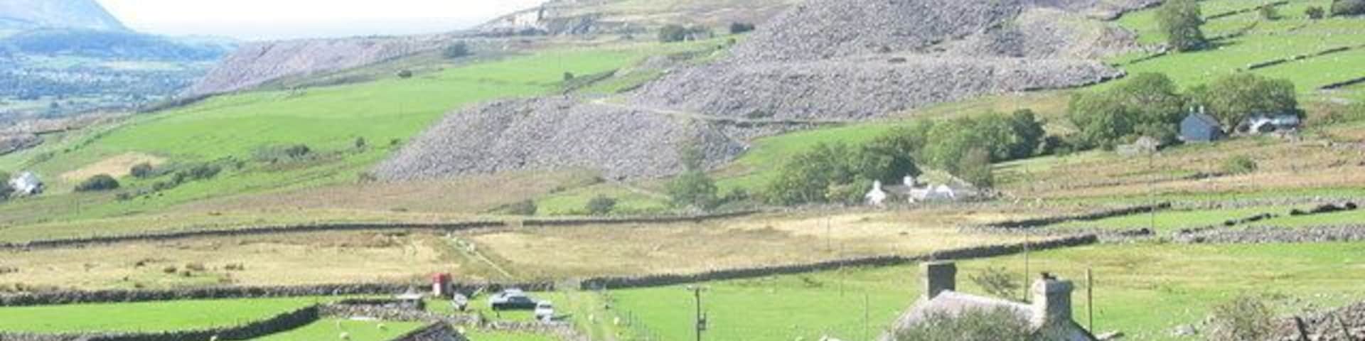 Castell Caeronwy. A small holding on the moorland edge. The name Castell Caeronwy comes from a nearby Iron Age fortlet.
