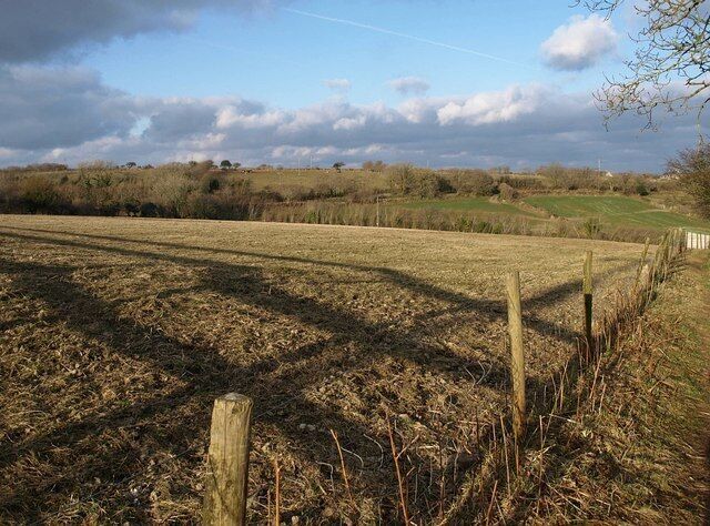 Field near Roselath With footpath 406/2/1 running along the right-hand edge, as it crosses a low ridge to a small valley and then into Lanlivery.