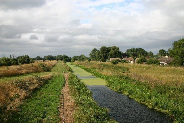 Cut-off Channel, near Lakenheath. The Cut-off Channel crosses Grime Fen, as viewed from Highbridge Gravel Drove. This drainage channel takes flood waters from the Lark, Little Ouse and Wissey rivers. The channel was completed in 1964.