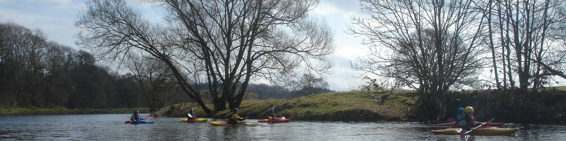 Eden below Kirkoswald The trip on the River Eden from Lazonby to Armathwaite starts with a placid section between broad floodplain fields. The left bank, opposite Kirkoswald, is a low-lying flat area enclosed by a broad sweeping bend. Occasional trees line both banks, but the river is wide enough that none provide any sort of hazard this early in the trip.