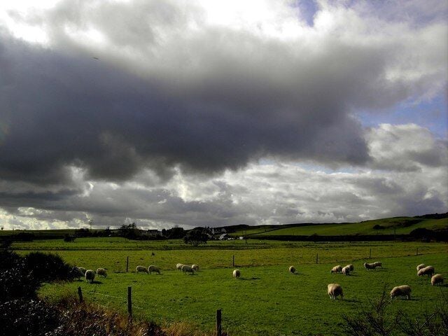 Clouds over Kirkgunzeon Storm clouds hover over the village of Kirkgunzeon.