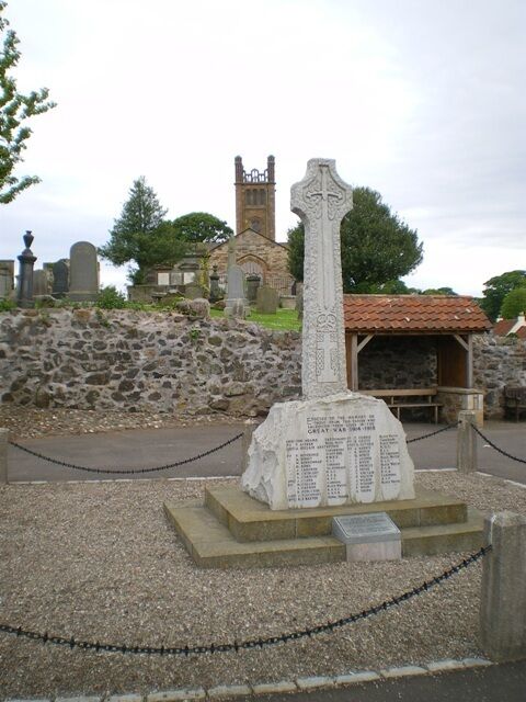 Kilconquhar War Memorial In the background, the kirk (and the bus stop)