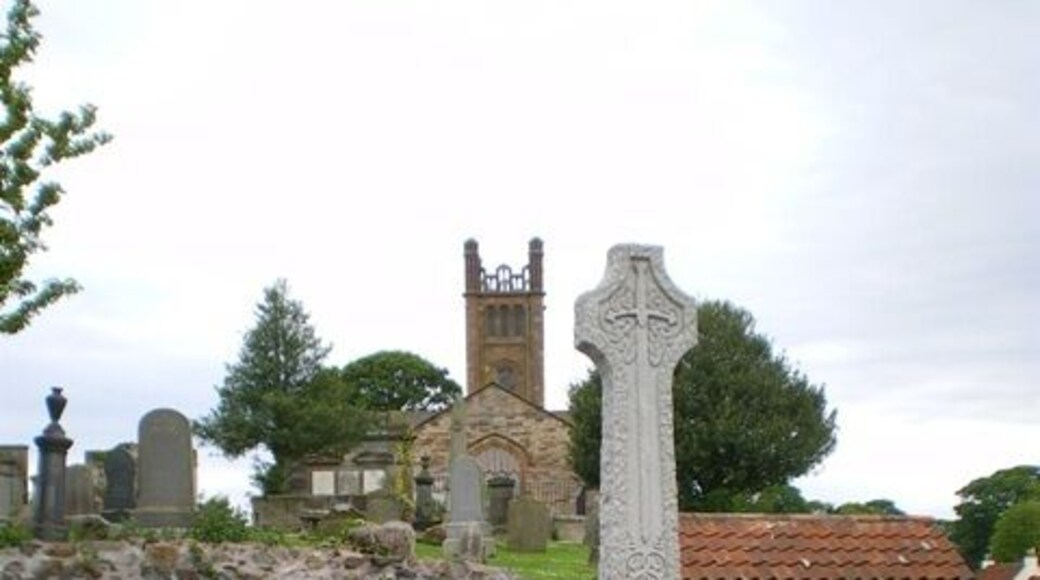 Kilconquhar War Memorial In the background, the kirk (and the bus stop)
